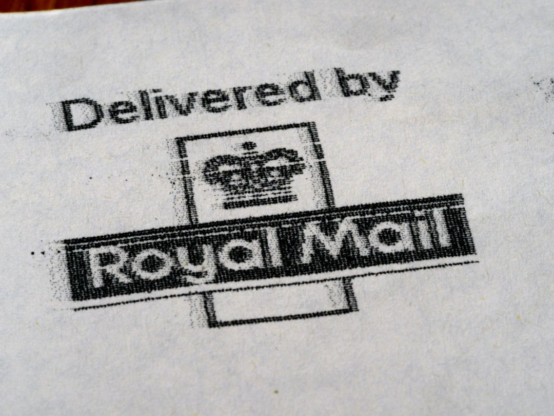 Close-up of an official stamp being pressed on a legal document